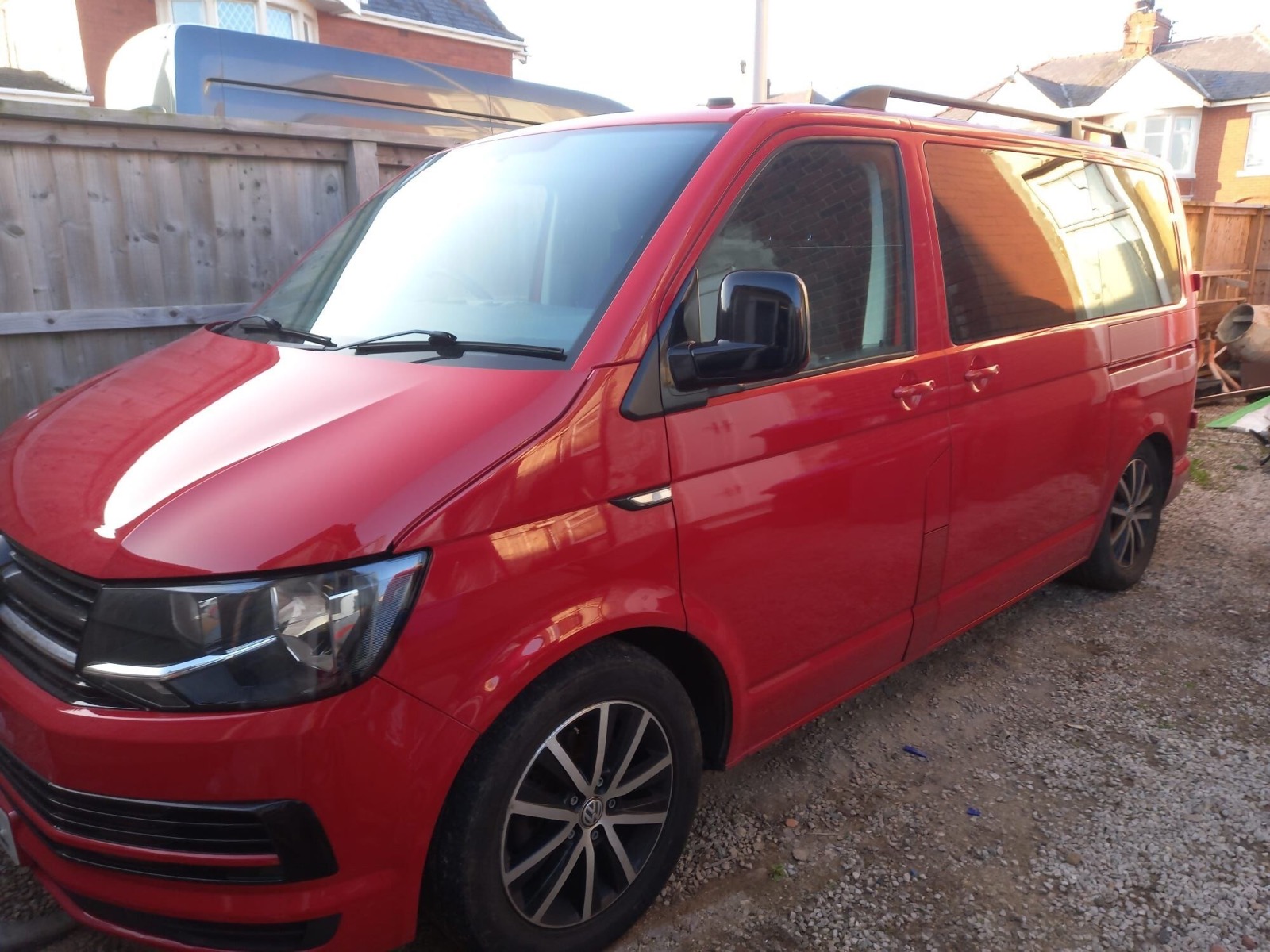Red van conversion viewed from the front